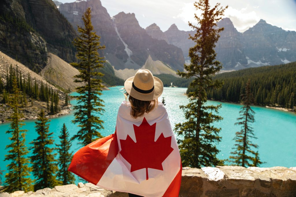 Person wrapped in Canadian flag